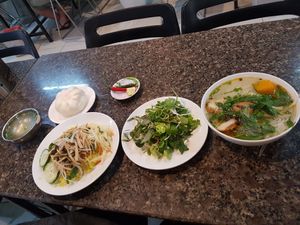 Steam buns, chicken fried rice, fish noodle soup.  at Ngoc Chi in Da Nang