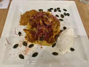 Cauliflower tenders on a bed of Boulgour served with leek/cabbage dip and an emulsion of candied lemon  at Les Bacchanales in Nancy