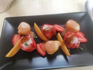 Peach and strawberry dessert at Les Bacchanales in Nancy