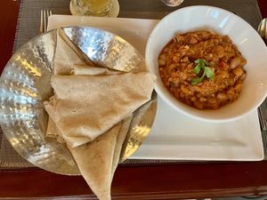 Baqel with Omani bread  at Bait Al Luban in Muscat