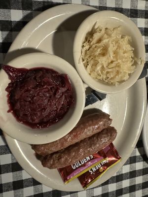 Plant based sausage with red cabbage and sauerkraut   at The Auslander in Fredericksburg