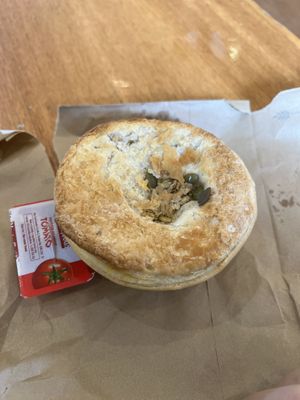 Pumpkin curry pie with free sauce   at Beechworth Bakery in Ballarat