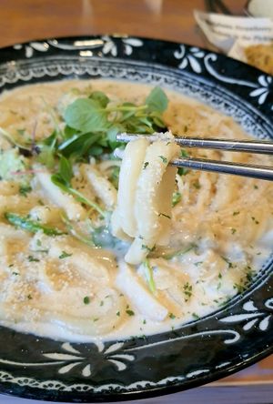 Vegan Carbonara Tteokbokki - close-up at Cow Tteokbokki  in Seoul