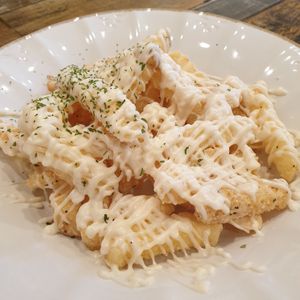 these fries tasted strange but were oddly addictive at Cow Tteokbokki  in Seoul