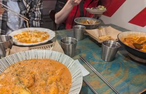 Bottom left - Vegan rose tteokbokki - I also got the king oyster mushrooms and glass noodles in seaweed (behind the bowl), would recommend :) at Cow Tteokbokki  in Seoul