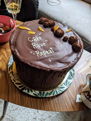 Chocolate Cake with hints of Yuzu, regular size (12-16 servings) with up to 3 words (103€) - 5/5. Amazing cake and service.  at Sakura in Berlin