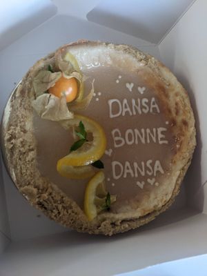 Small Lemon Cheesecake (50€) with three letters (8€). 
 at Sakura in Berlin