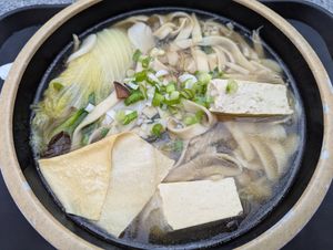 Tofu, noodles, cabbage, bok choy in vegan mushroom broth at Tang Bar in San Francisco