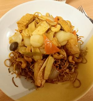 Cashew nut stir fry with soft noodles at Wawin Vegan Chinese in York