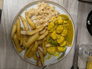Vegan satay chicken curry with fried rice and salt and pepper chips at Wawin Vegan Chinese in York