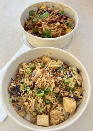 Veg fried rice with tofu (Front) and stir fried veg noodles with tofu (Back)   at Ayers Wok in Yulara