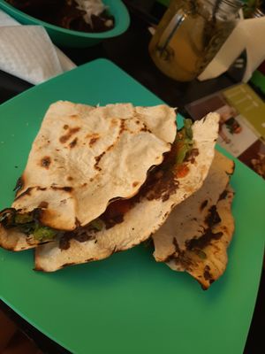 Tlayuda de champiñones at Los Muchitos Comida Vegana in Oaxaca