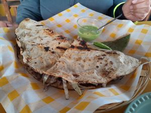 Tlayuda at Los Muchitos Comida Vegana in Oaxaca