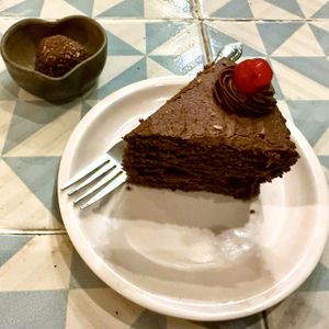 Chocolate cake and trufflee  at Los Muchitos Comida Vegana in Oaxaca