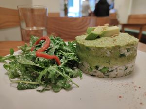 Rumi's Dream : avocado spin on a traditional Persian recipe, made of risotto, avocado, edamame, dill and pine nuts, topped with avocado vegan yoghurt sauce. It was just PERFECT.  at Avocado in Athens