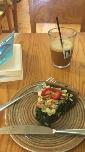 Spinach tart and Freddo Cappuccino with almond milk  at Avocado in Athens