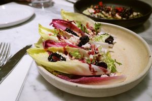 Almond feta and bitter leaves   at Mallow - Borough Market in South East London