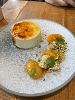 crème brûlée, anise apricots, pistachio biscuit crumbs  at Mallow - Borough Market in South East London