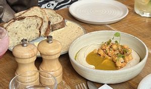 Sourdough and caramel butter and hummus with lime pickle chickpeas  at Mallow - Borough Market in South East London