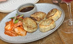 Dumplings with gochujang sauce  at Mallow - Borough Market in South East London