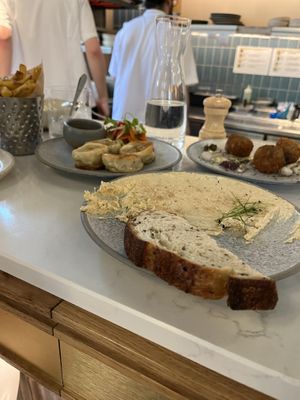 Sourdough with caramel “butter”, shiitake croquettes , dumplings with gochugang  at Mallow - Borough Market in South East London