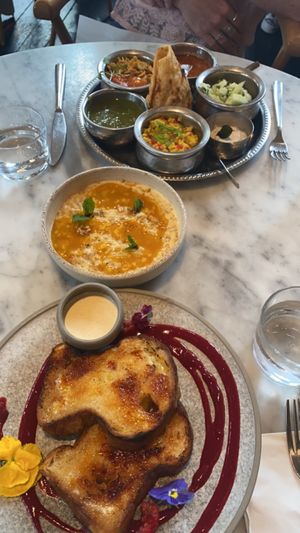 brunch thali at the top, mango porridge, and French toast   at Mallow - Borough Market in South East London
