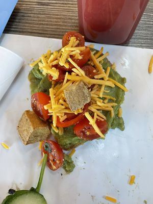 Avocado Tomato basil toast   at Avocado Theory in Tinley Park
