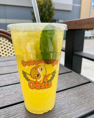 Minty Pineapple Lemonade with chunks of fruit  at Guacamaya Oasis Plant Based Mexican Cuisine in Downey