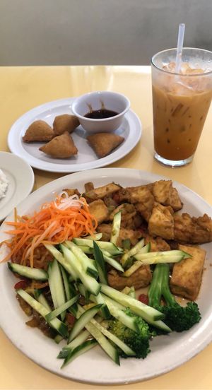Lemon grass tofu (with white rice), samosas, and Thai tea  at Loving Hut in Falls Church