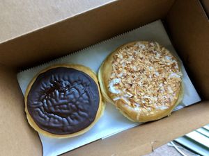 Boston cream and coconut cream donuts! 🍩😍 at Loving Hut in Falls Church