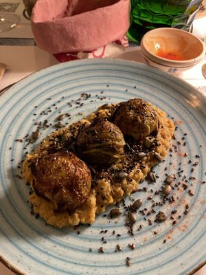 Cabbage spheres with lentils and potatoes   at La Svolta in Bologna