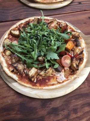 Vegan pizza/ half potato pizza and half roasted vegetarian. So flavoursome and the best vegan cheese.  at Round Hill Road in Agnes Water