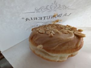 Slightly smashed peanut butter donut at La Donuteria - Spalena in Prague
