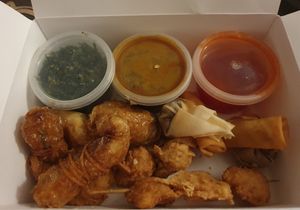 Wawin Special Combo: Crispy seaweed, crispy vegan wonton (2), vegan spring rolls (2), vegan chicken drumsticks (2), vegan chicken skewers in satay sauce (2), vegan prawn (2), serve at Wawin Vegan Chinese in Salford