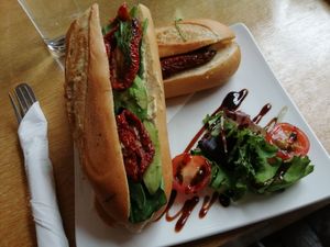 Avocado, spinach, sun-dried tomatoes, hunous at World Peace Cafe in Leicester