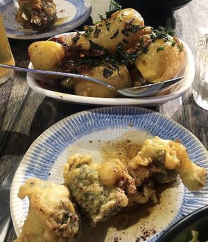 Chilli potatoes and broccoli skewer  at Rail House Café in London