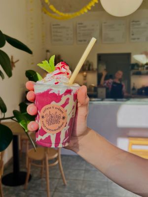 blueberry & salty cashew shake with coconut whippedcream and cashew topping 🔥 at Imaginarni Zmrzlina in Prague