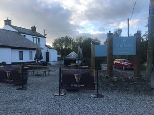 Outside tables at The Barn Bar & Country Kitchen in Downpatrick