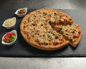 Vegan Italiano pizza
with beyond vegan sausage  at Sarpino's Pizzeria in Coral Springs