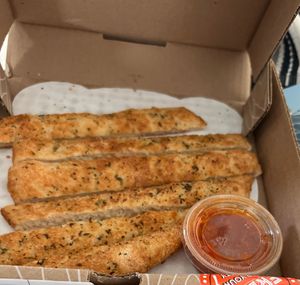 Vegan breadsticks. I already had some before this picture. They give a lot.  at Sarpino's Pizzeria in Coral Springs