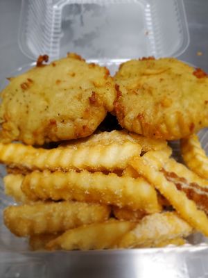 Vegan chicken nuggets and seasoned fries at Julie's Guilt-Free Sweet Treats in Tucson