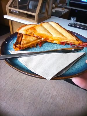 Curried Chickpea, pickled onion and Vegan cheese toastie. at Little Collins CBD Dispensary in Kilkenny