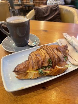 Vegan ham and cheese with coffee  at kave in West London