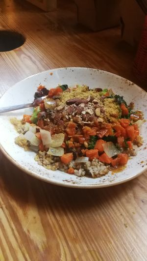 The Swami US$5.45+
A sweet curried miso sauce saturating a flavorful mix of tamari almonds, raisins, shredded carrots, broccoli, dark greens, and pearl onions over brown rice with  at Life Alive Organic Cafe in Cambridge