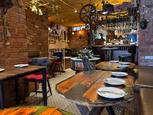 Gentle water fountain and lovely jazzy atmosphere   at Palmyra's Kitchen in North London