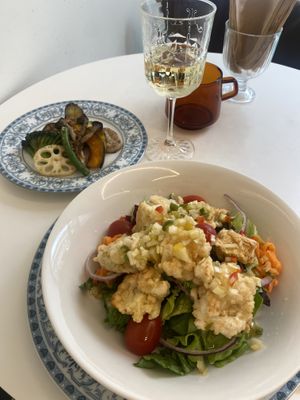 Bean chicken salad with side of pan fried hot vegetables  at Sunny Bowl in Seoul