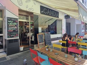 Front with terrace. Gave them a Happy Cow window decal. Hope they put it on! at Elea Candia in Cologne