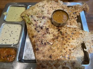 Dosa with dried fruits, filled with potatoes and chutneys   at Saravanaa Bhavan in Berlin