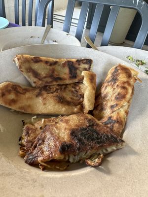 Fried flat bread with potato filling   at Nasiba in Buqata