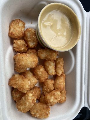 Only HALF of the tots and cheese! HIGHLY recommend. I ate most of them before taking a photo   at Saucy Cluckers in Boulder